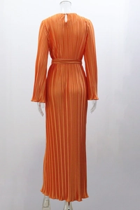 Detail of the back keyhole closure and pleated fabric on this orange maxi dress