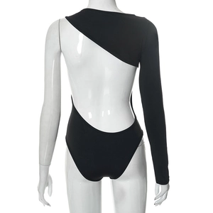 Close-up of asymmetrical backless one-shoulder long sleeve bodysuit on mannequin