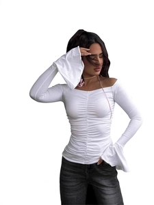 Women's off-shoulder white long sleeve top with ruched front and elegant bell sleeves