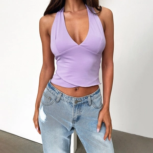 Detail view of lavender V-neck halter top with unique asymmetrical cross-cut hem design