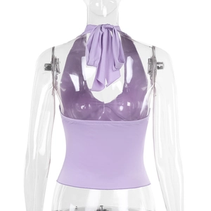 Detail view of purple backless halter top with large ribbon bow tie closure