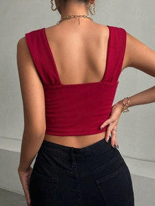 Back view of red square neck ribbed knit cropped top with wide shoulder straps