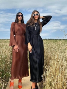 Elegant pleated long sleeve dress with high neck and waist belt in brown and black
