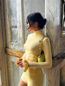Slim fit bright yellow high neck dress with ruffled bell sleeves and ribbed texture