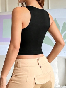 Women's vintage black irregular cutout crop top with khaki cargo pants casual outfit