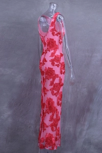 Detail of pink sleeveless dress with 3D red floral embroidery and open back V-neck design