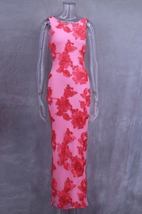 Detailed close-up of floral embroidery on pink tulle for this elegant sleeveless dress