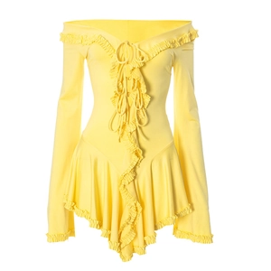 Macro detail of yellow off-shoulder dress with lace-up front and ruffle trim