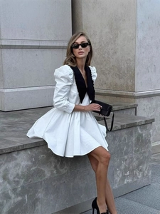 French vintage white mini dress with contrasting black doll collar and puff sleeves