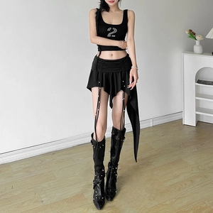 Detail of black asymmetrical skirt featuring ruched waist and white beaded drawstrings