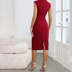 Detail view of the elegant back slit and slim fit of the burgundy sleeveless party dress