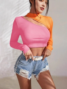 Women's slim fit long sleeve top featuring pink and orange contrast cutout design
