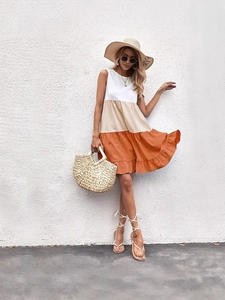 Elegant sleeveless round neck dress for women with color-block design and ruffled hemline