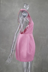 Detail of pink sleeveless dress with side deep V-cut and gold embossed buttons