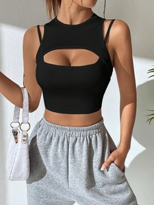 Slim fit black crop top with oval chest cutout and thin shoulder straps for women