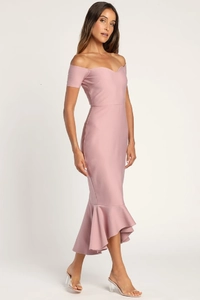 Detail of the elegant pink off-shoulder heart neckline and fitted fishtail hemline