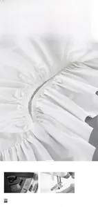 Detailed close-up showing exquisite stitching and pleated ruffles of the white cotton vest