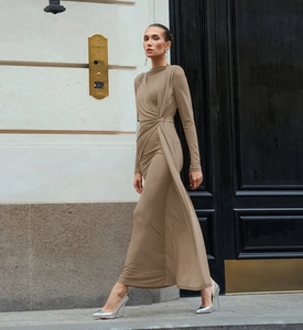 Detail of side knot and elegant draped ruffles on khaki long sleeve crewneck dress