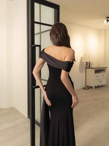 Slim fit black off-shoulder evening dress with satin ribbon detail and mermaid hemline