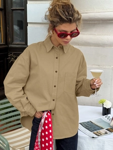 Oversized khaki cotton utility shirt with lapel collar and single chest pocket for women
