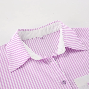 Close-up of pink and white striped shirt collar showing M size label and neat stitching