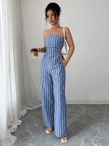 Detail of blue and white striped bandeau top and high waist wide leg trousers