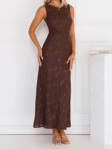 Detail of dark brown lace maxi dress featuring delicate sequins and sleeveless design