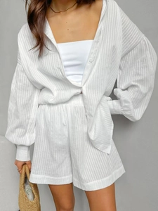 White cotton jacquard two-piece set featuring loose lantern sleeve shirt and matching shorts