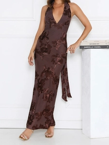 Detailed view of dark brown halter maxi dress featuring deep V-neck and 3D floral embroidery