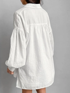 White cotton jacquard set featuring loose puff sleeve shirt and shorts with vertical stripes