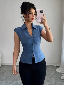 Slim fit long sleeve blue shirt with knotted waist design and black high-waisted pants
