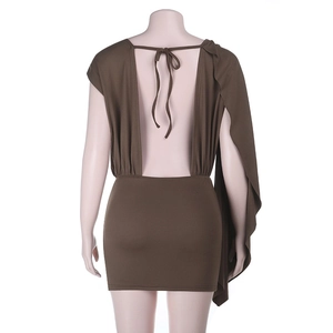 Detail view of brown backless mini dress featuring cross-tie straps and asymmetric drape