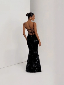 Elegant backless black A-line dress with pearl bow and intricate floral lace detailing