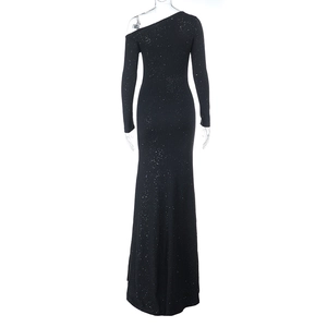 Detail view of the back of a black sequin dress with an asymmetric off-shoulder design