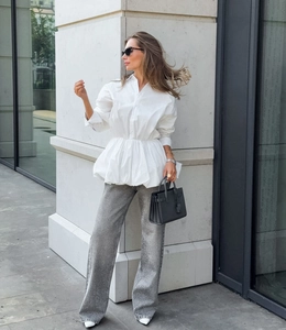 Chic women white peplum waist cotton shirt styled with shiny silver sequin wide-leg pants