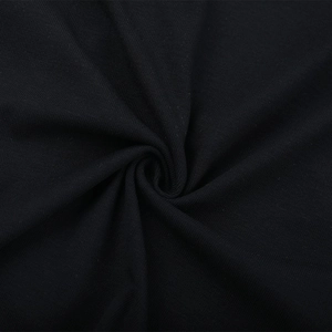 Detail of premium black ribbed knit fabric texture with soft drapery and elastic weave