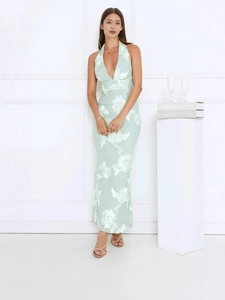 Elegant mint green halter maxi dress with white floral embroidery and a deep V-neckline
