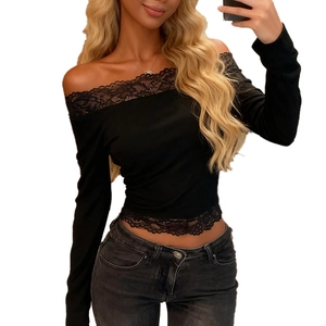 Detailed view of the off-the-shoulder neckline with delicate black lace trim detailing