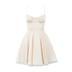 Detail of a sweet balletcore mini dress with lace trim and layered tulle hem