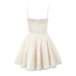 Detailed back view of a ballet-style pink satin mini dress with mesh hem and invisible zipper