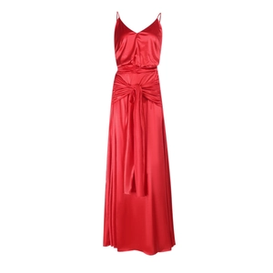 Detail of red satin dress featuring a V-neckline and elegant waist knot design