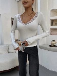 Elegant ivory white V-neck long sleeve knit top with delicate lace trim for women