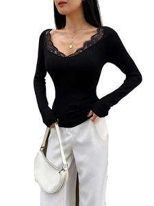 Women's black V-neck ribbed long sleeve top with elegant lace trim and slim fit design