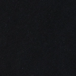 Detailed close-up showing the fine textile texture and quality of the black fabric dress