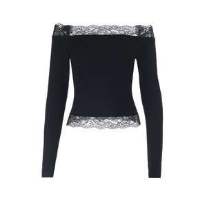 Detail view of the black off-shoulder long-sleeve top with delicate floral lace trim