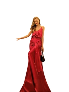 Elegant red satin evening gown with deep V-neck and thin straps for a formal occasion