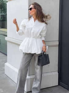 Elegant white long sleeve peplum shirt with cinched waist and button-down collar for women