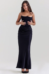 Detail of elegant black corset dress featuring satin fabric and waist pleats for formal party