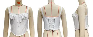 Detailed views of white lace-up corset top showing front lacing and back tie structure