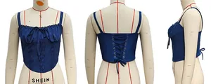 Detailed views of navy blue lace-up corset top with adjustable ribbon back and lace trim